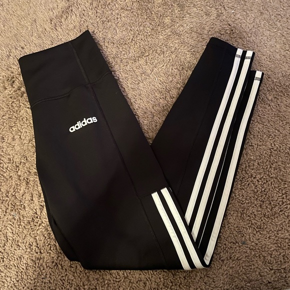 Women’s size small adidas leggings with white stripe halfway down the leg. - Picture 2 of 3